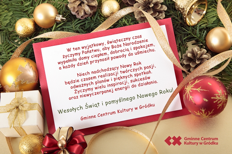 Blank Christmas card or invitation with red envelope surrounded by ribbons and decorations. Space for copy.